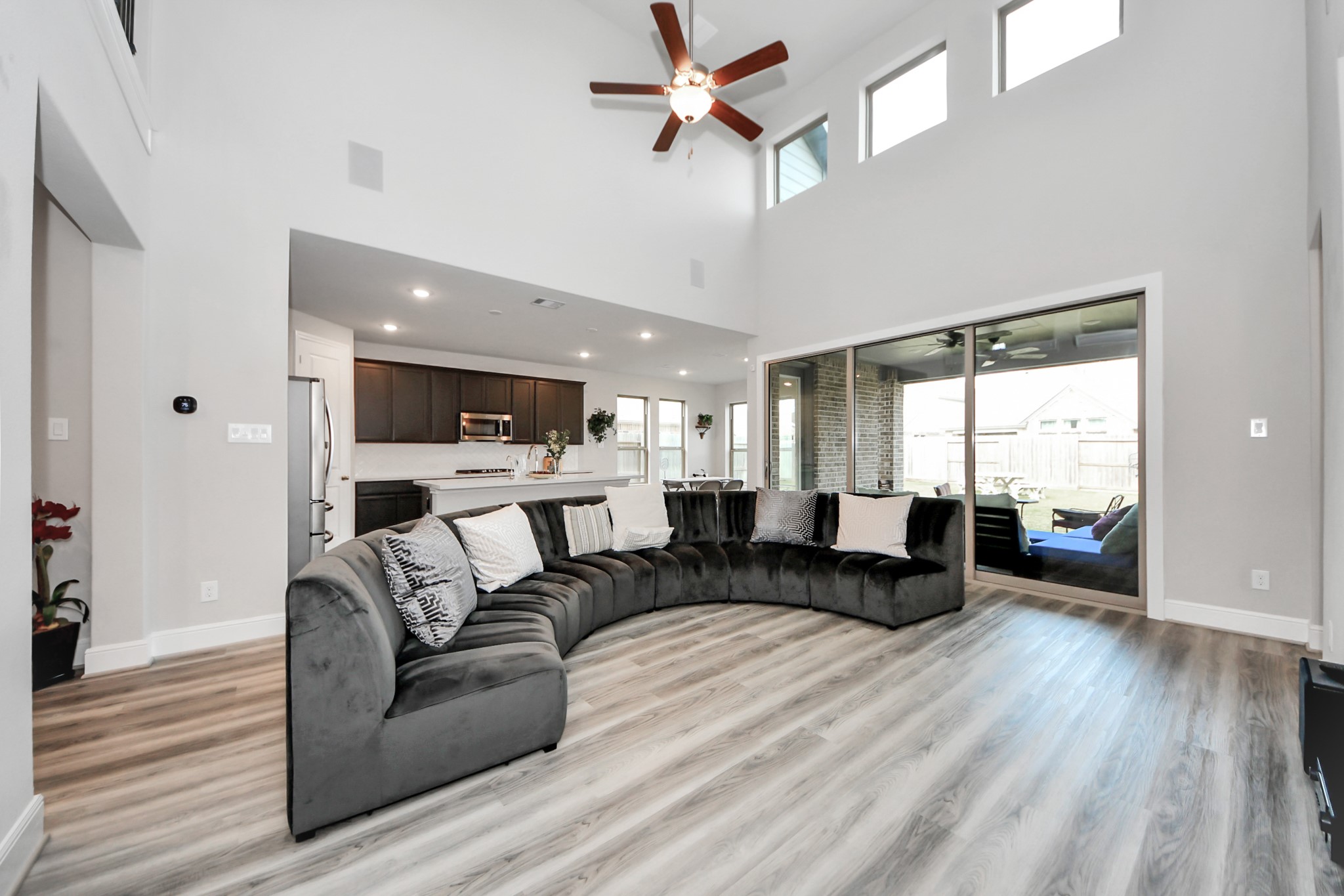 10514 Rigel Rdg Way Richmond, TX 77406 - Photo 12 of 50 a living room with furniture and a wooden floor