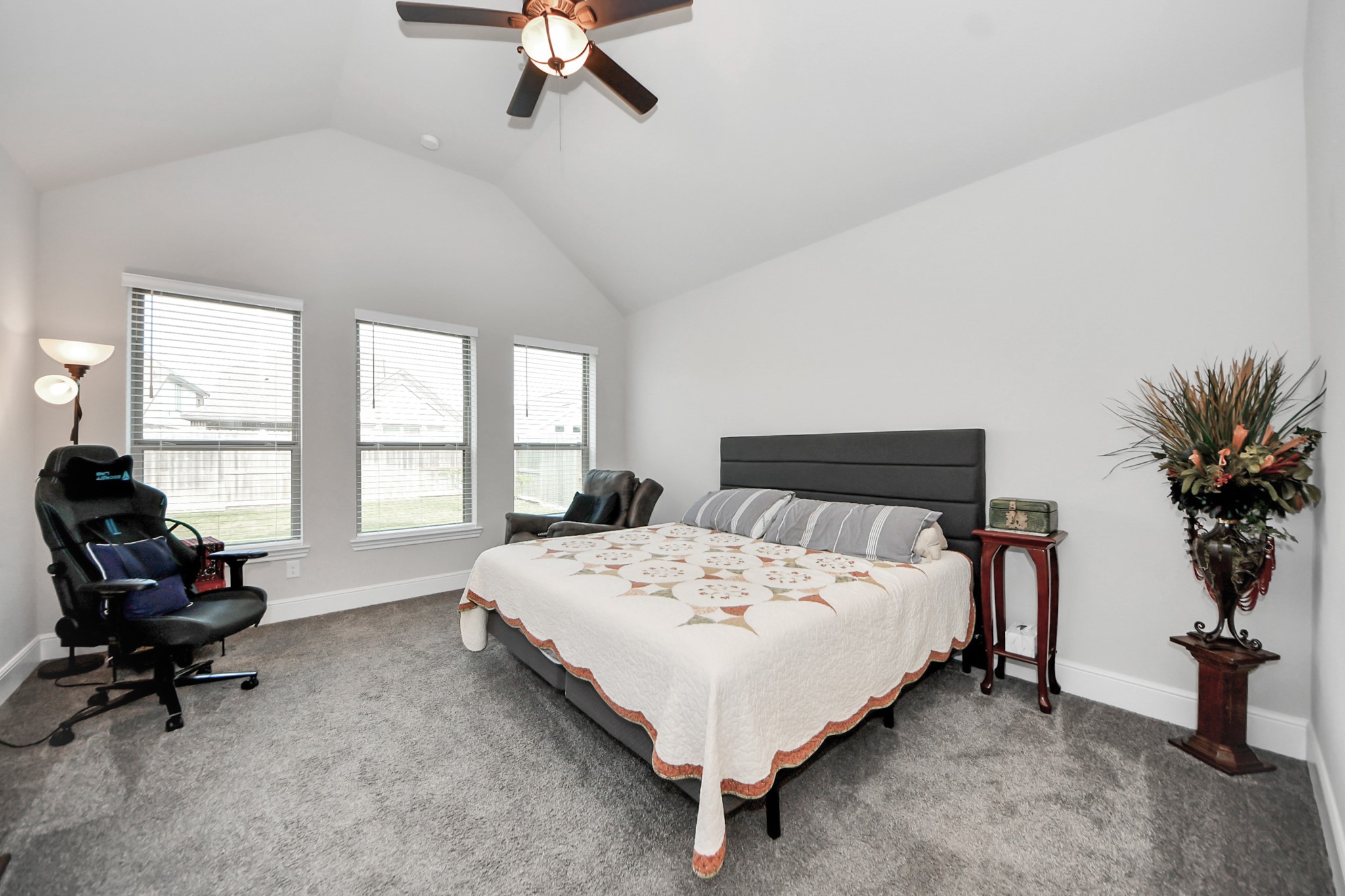 10514 Rigel Rdg Way Richmond, TX 77406 - Photo 23 of 50 a bedroom with a bed chair and window