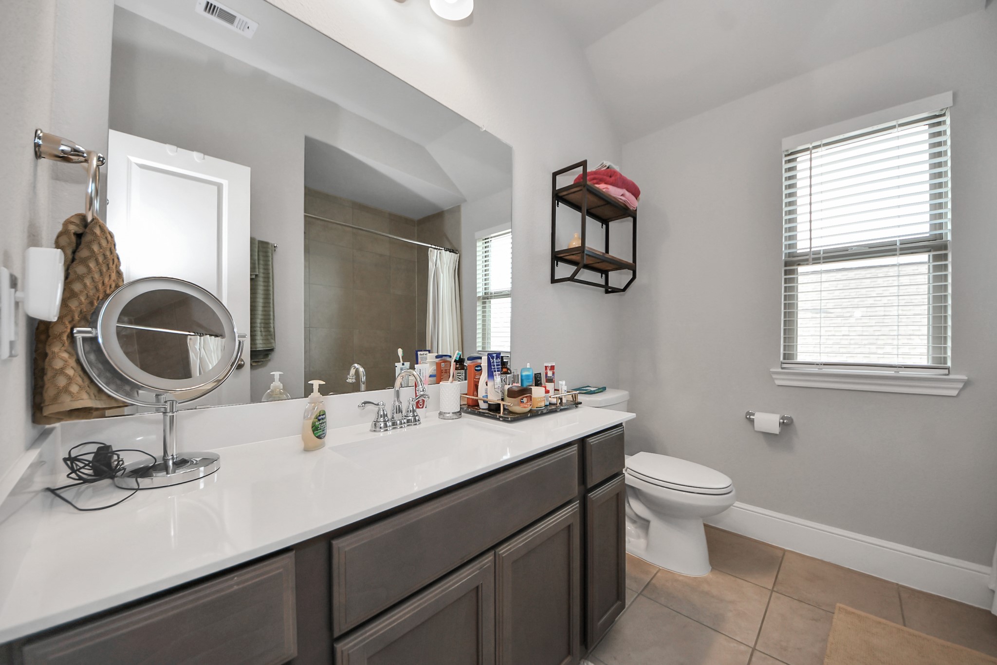 10514 Rigel Rdg Way Richmond, TX 77406 - Photo 38 of 50 a bathroom with a sink and a mirror