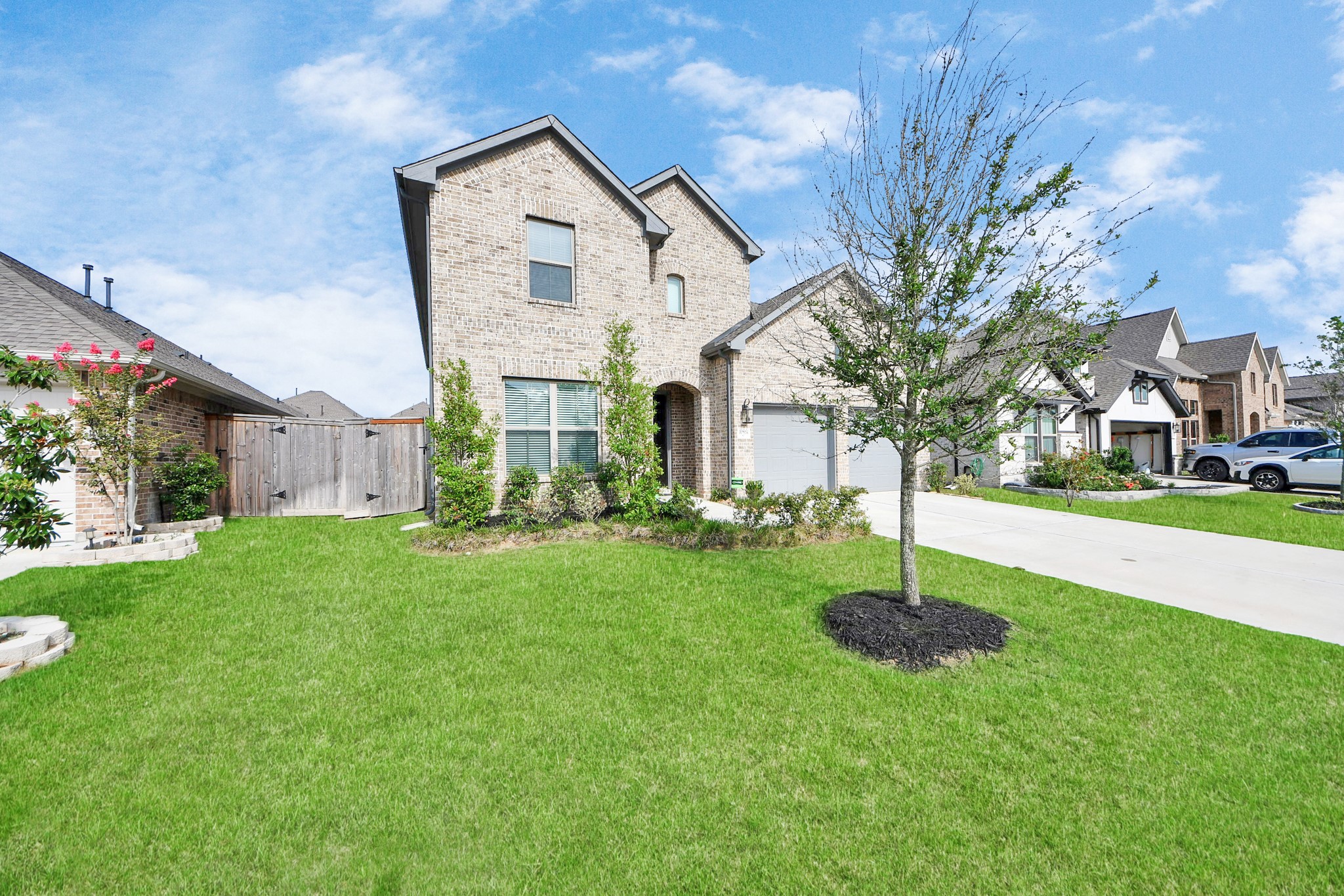 10514 Rigel Rdg Way Richmond, TX 77406 - Photo 46 of 50 a front view of house with a garden