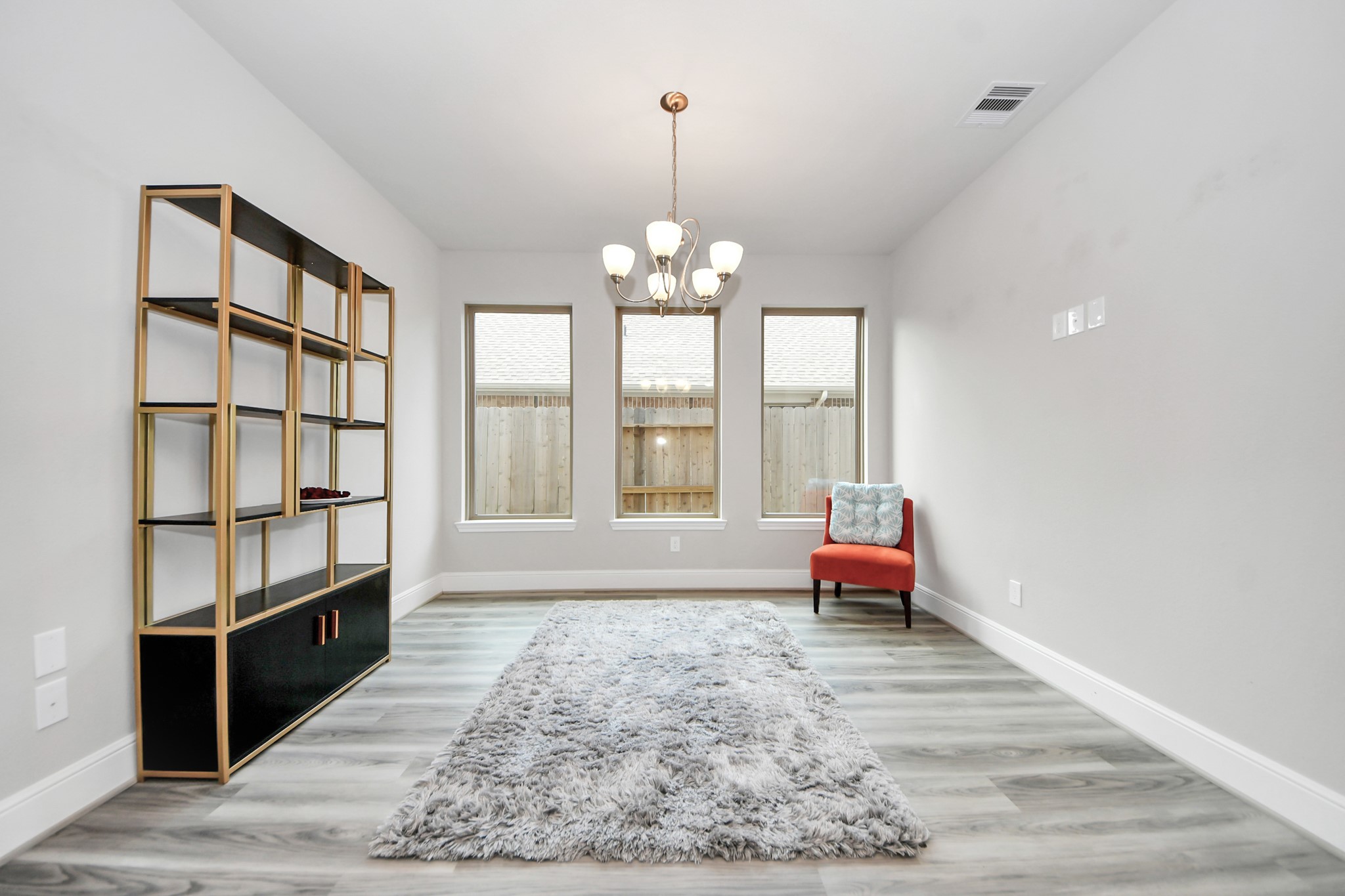 10514 Rigel Rdg Way Richmond, TX 77406 - Photo 5 of 50 a living room with furniture and a large window