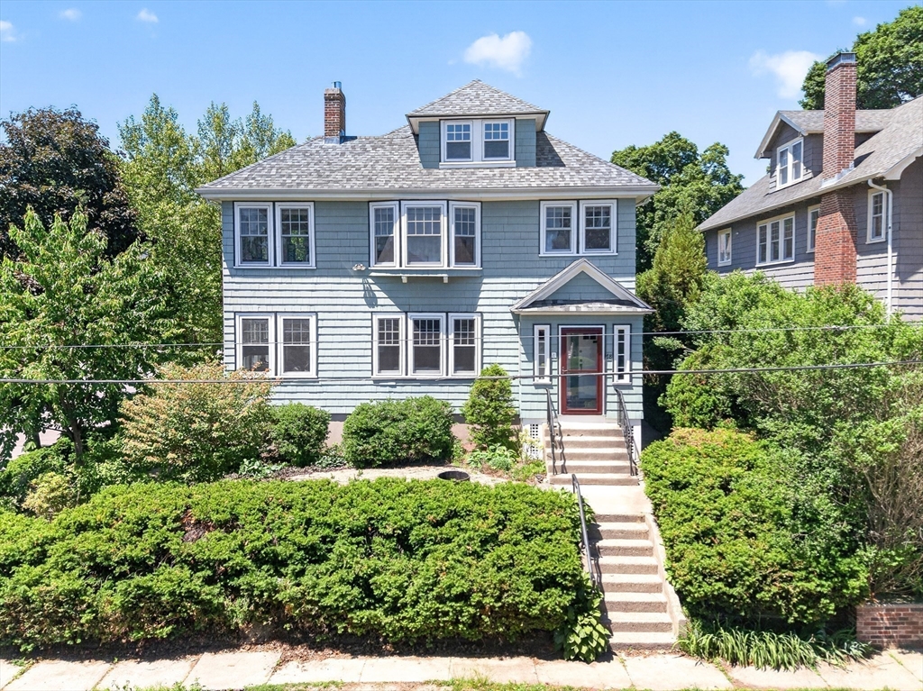 76-78 Lewis Road Belmont, MA 02478 - Photo 20 of 36 a front view of a house with a yard