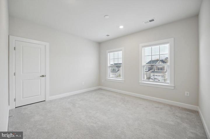 325 Piper Lane Exton, PA 19341 - Photo 17 of 24 a view of an empty room with a window