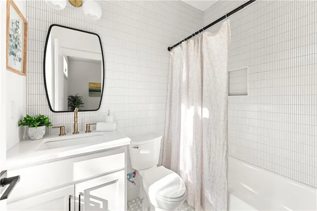 a view of kitchen with a sink and living room