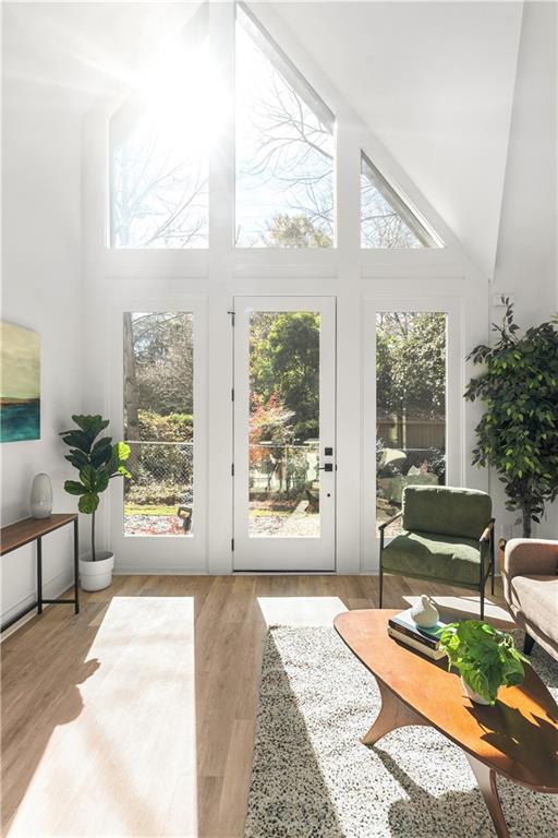 845 Ormewood Terrace Southeast, Unit C Atlanta, GA 30316 - Photo 2 of 37 a living room with furniture and a large window