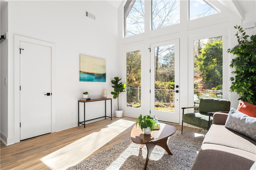 845 Ormewood Terrace Southeast, Unit C Atlanta, GA 30316 - Photo 23 of 37 a living room with furniture and a large window