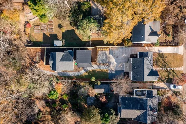 a view of a yard with wooden fence and floor