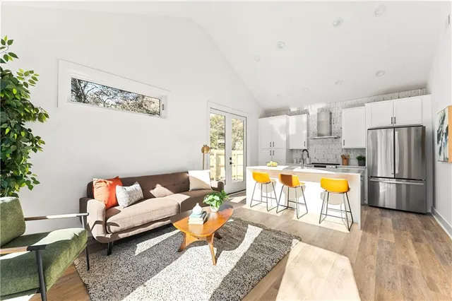 a living room with furniture and a table