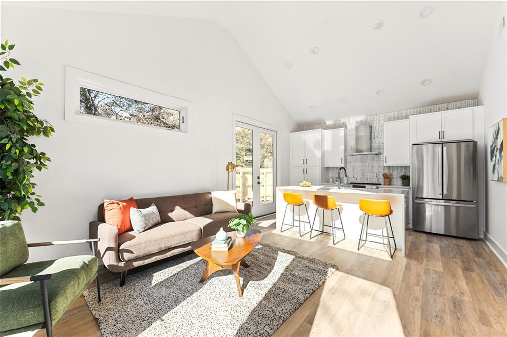 845 Ormewood Terrace Southeast, Unit C Atlanta, GA 30316 - Photo 3 of 37 a living room with furniture and a table