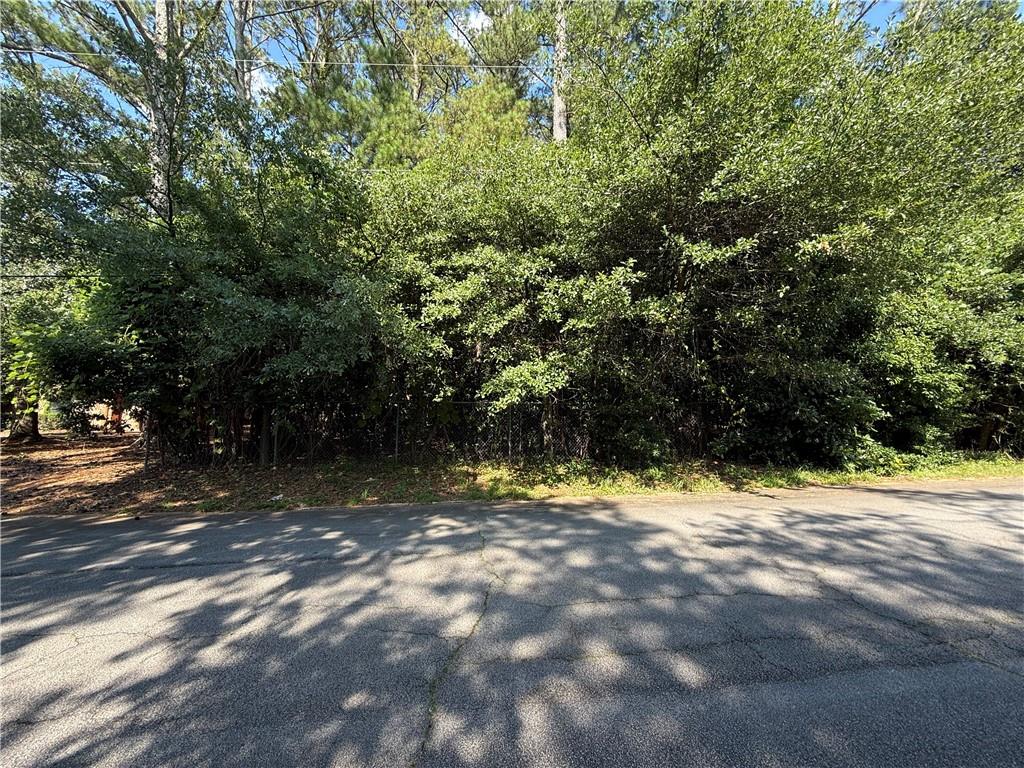 0 North Hicks Circle Northwest Conyers, GA 30012 - Photo 2 of 8 a view of a yard with a tree