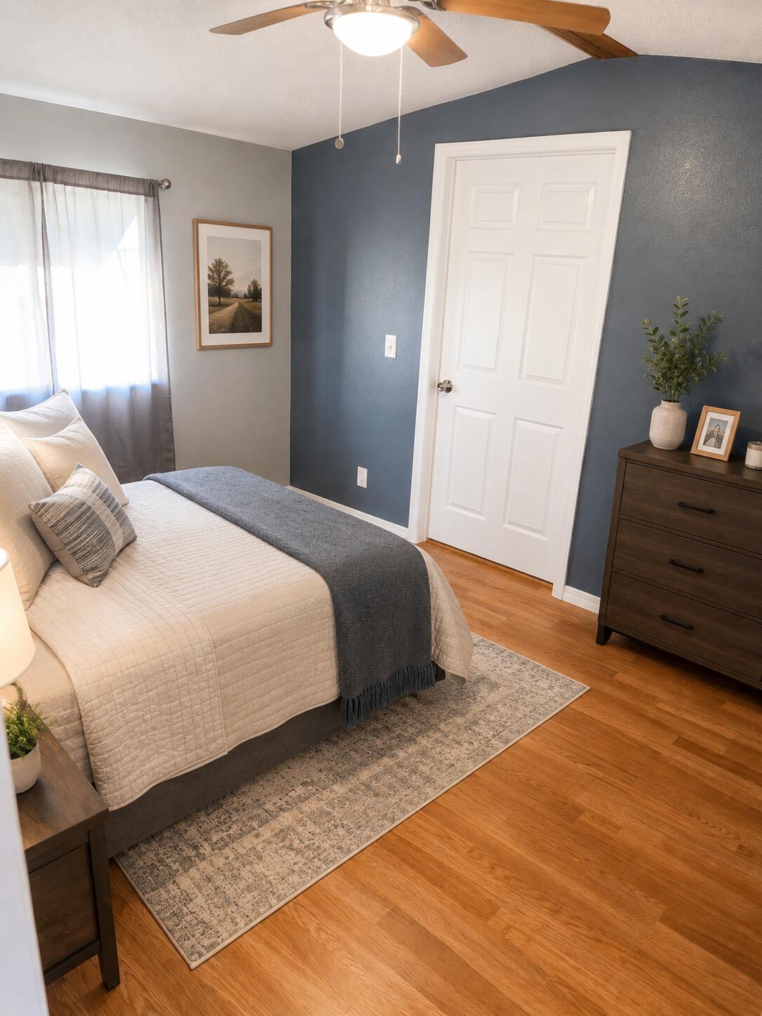2547 Chatham Way Northeast Palm Bay, FL 32905 - Photo 10 of 24 a bedroom with a bed and wooden floor