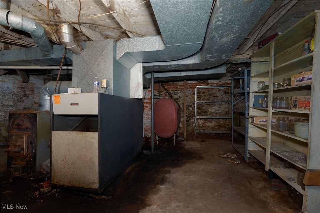 4491 Fox Road Kingsville, OH 44048 - Photo 30 of 33 Utility room with heating unit