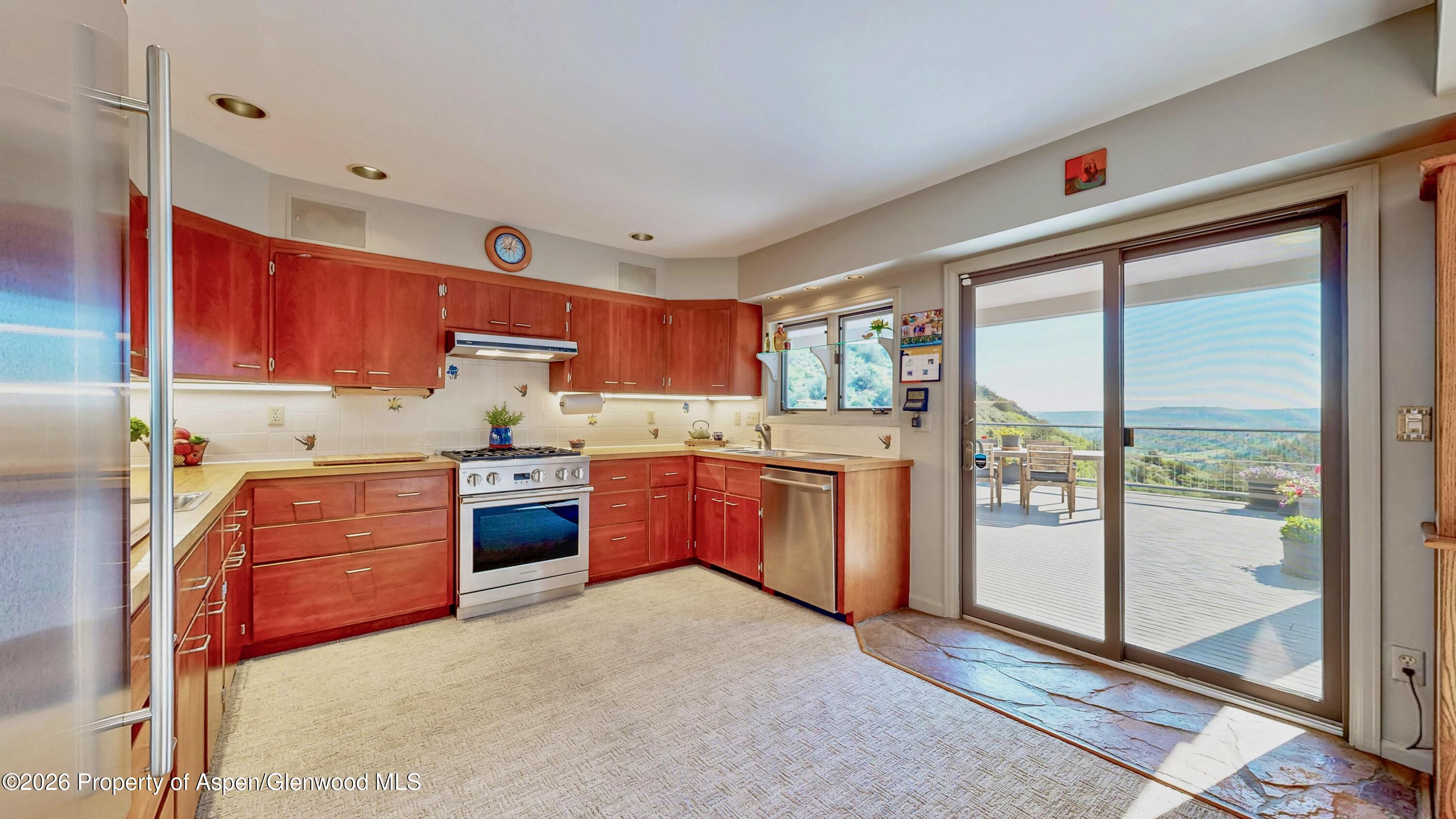 2602 Hidden Valley Road Sedalia, CO 80135 - Photo 3 of 13 Ktichen to Deck