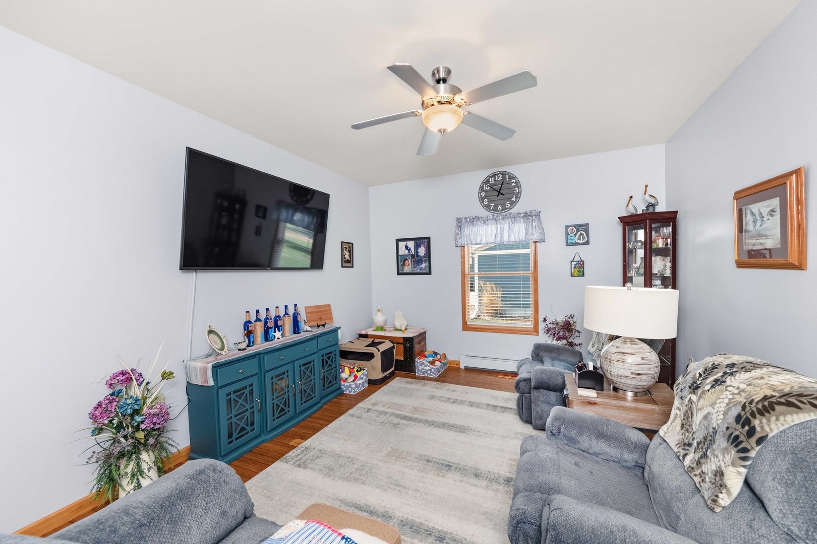 620 West 6th Street Minonk, IL 61760 - Photo 10 of 35 a living room with furniture and a flat screen tv