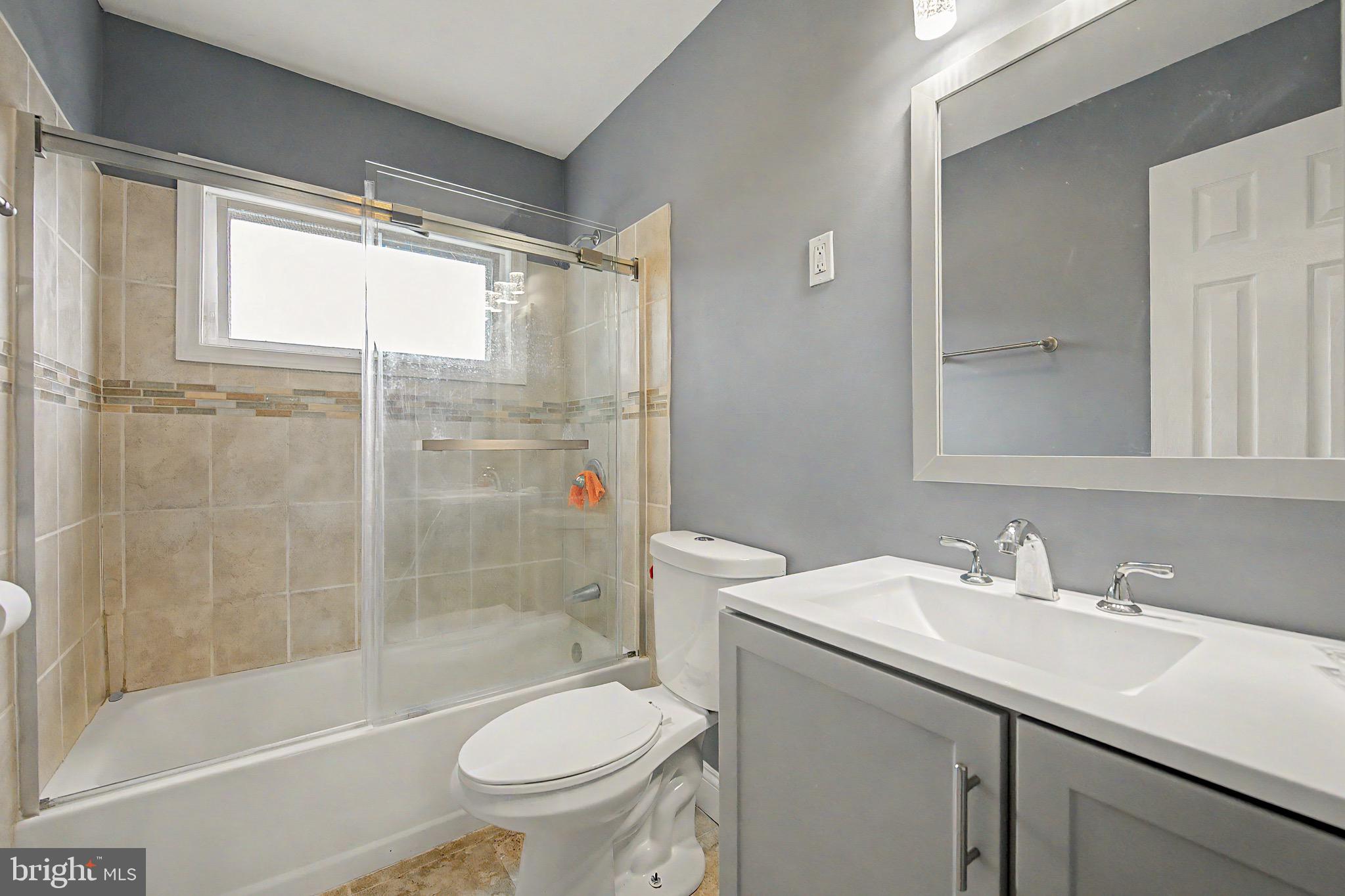 16 Malvern Road Newark, DE 19713 - Photo 22 of 35 a bathroom with a sink toilet and shower