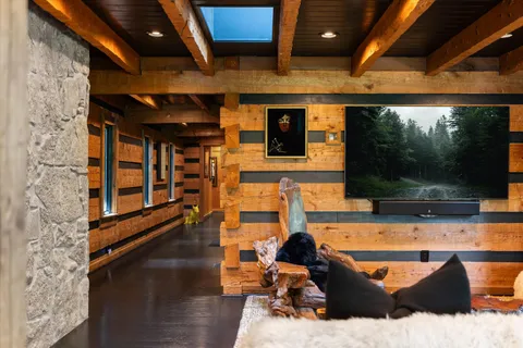 a view of a room with wooden floor