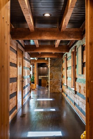 a dining room with furniture window and wooden floor