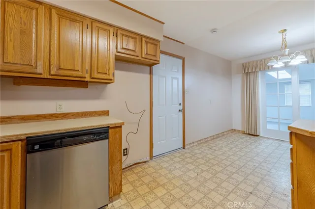 a view of a kitchen with electric appliances
