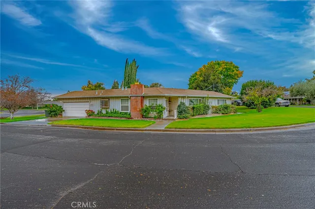 a aerial view of a house with a yard