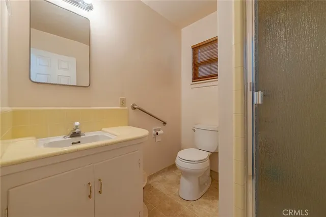 a bathroom with a sink and a toilet
