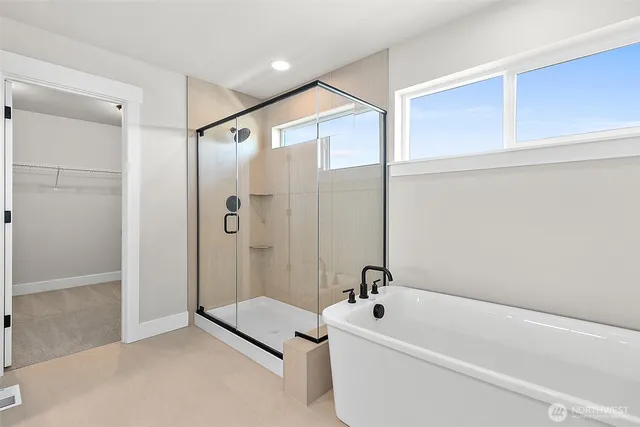 a view of a backyard with a wooden fence