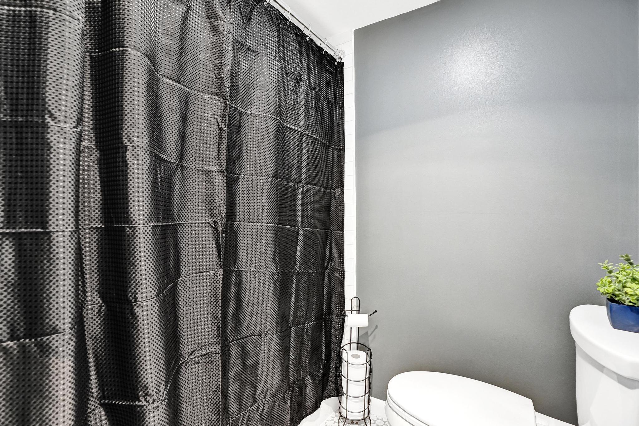 300 Ocean Trail Way, Unit 410 Jupiter, FL 33477 - Photo 38 of 58 a bathroom with a toilet and a shower