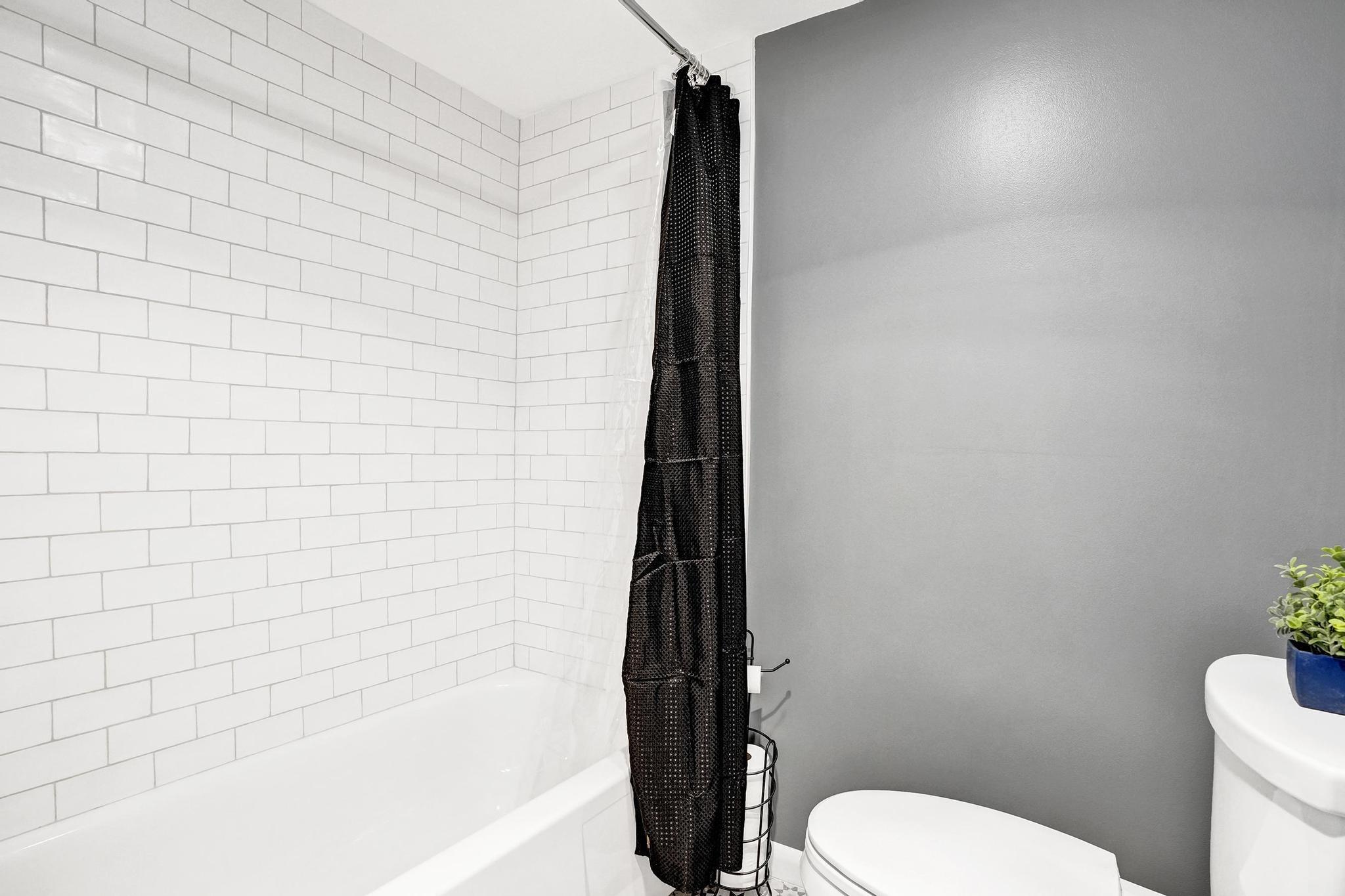 300 Ocean Trail Way, Unit 410 Jupiter, FL 33477 - Photo 39 of 58 a bathroom with a toilet and a shower