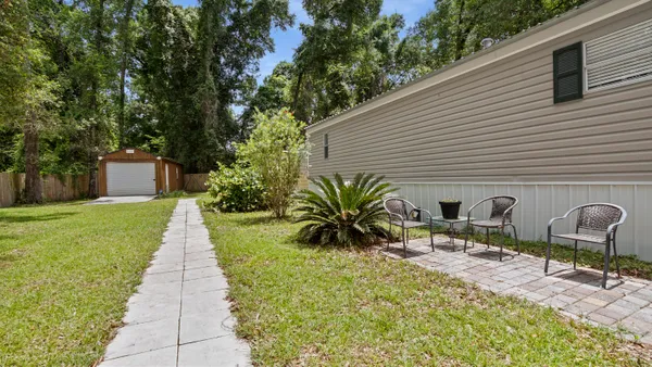 a front view of house with yard and seating