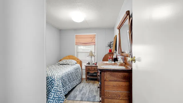 a room with furniture and a window