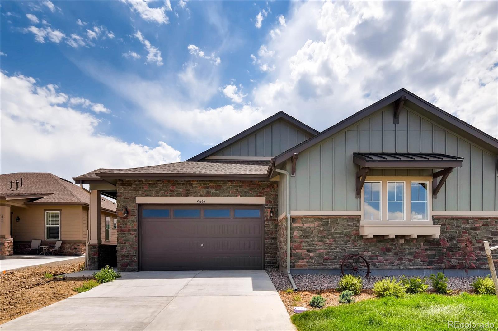 5052 West 109th Circle Westminster, CO 80031 - Photo 1 of 30 a front view of a house with garden