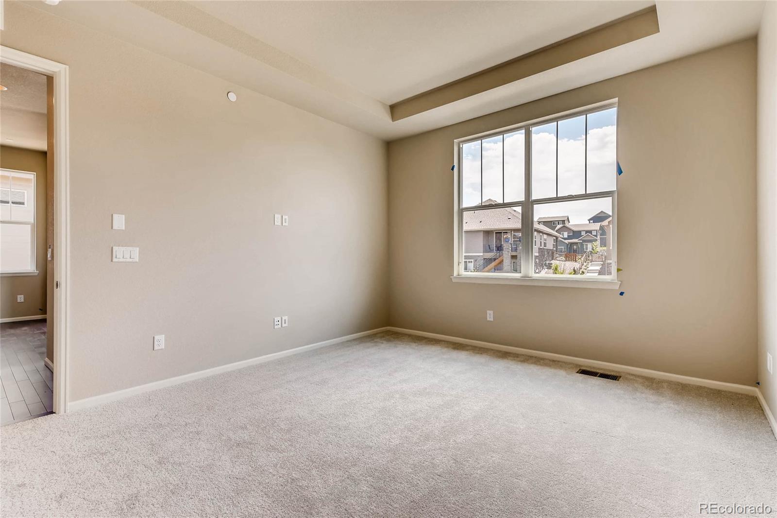 5052 West 109th Circle Westminster, CO 80031 - Photo 15 of 30 an empty room with windows