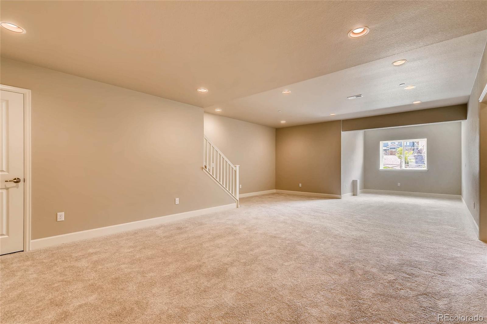 5052 West 109th Circle Westminster, CO 80031 - Photo 21 of 30 a view of an empty room with a window