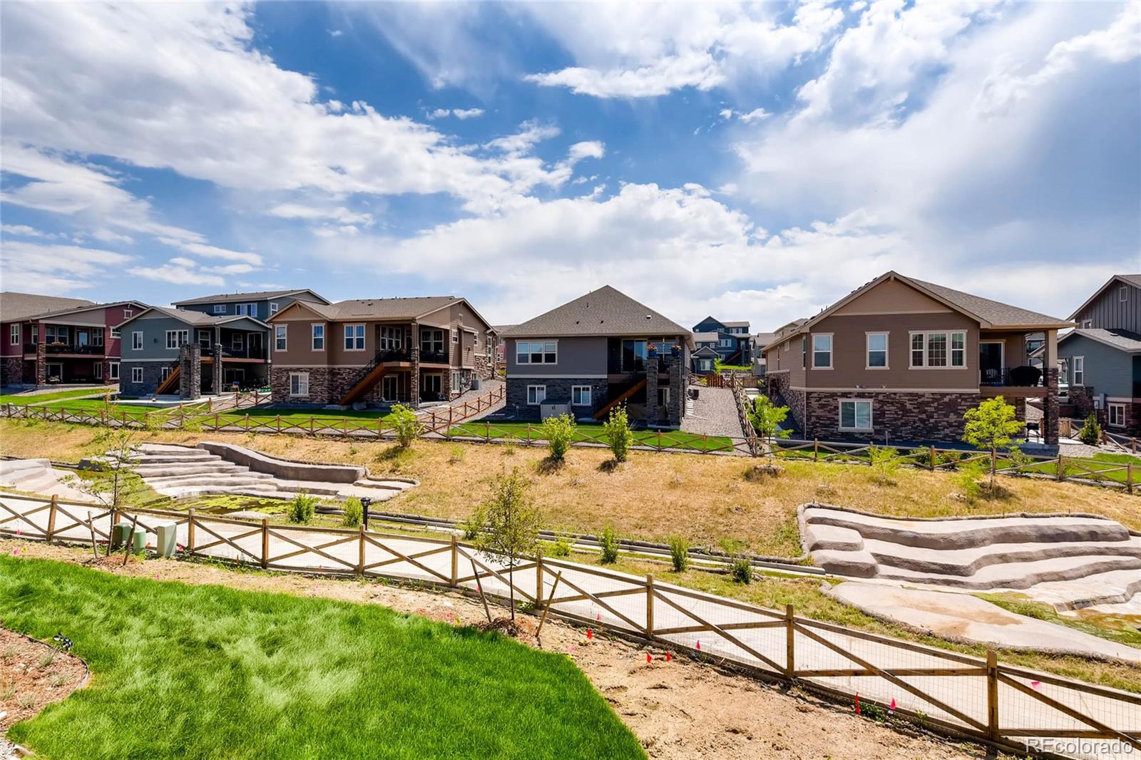 5052 West 109th Circle Westminster, CO 80031 - Photo 28 of 30 a view of a house with swimming pool and sitting area