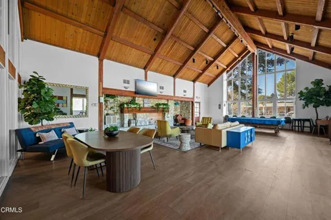 a view of road with large trees