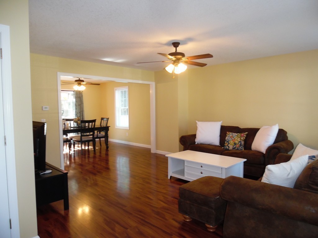 230 Russell Street Springfield, MA 01104 - Photo 4 of 18 a living room with furniture and wooden floor