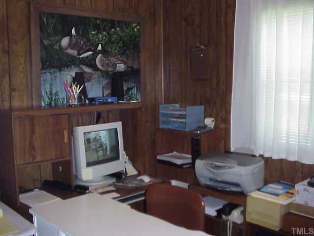 90 Pine Ridge Road Henderson, NC 27537 - Photo 7 of 11 Panelled room makes this office a great for you.
