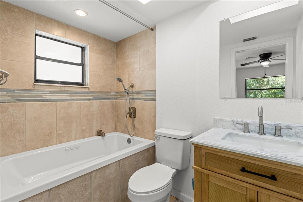 5700 South Calgary Terrace Inverness, FL 34452 - Photo 23 of 39 a bathroom with a sink a toilet and bathtub