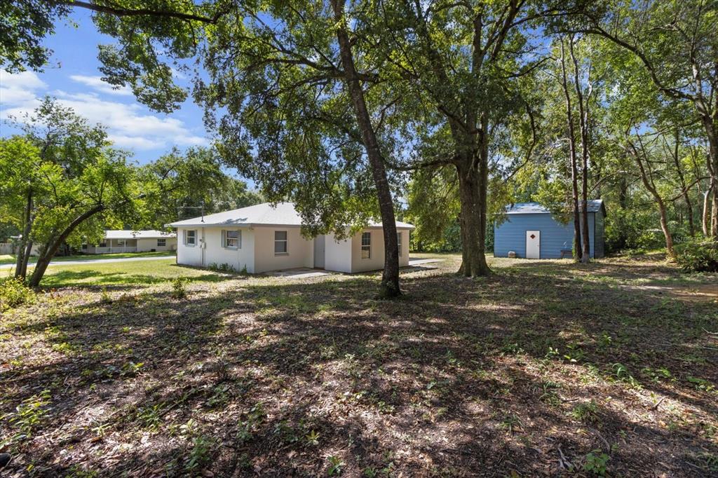5700 South Calgary Terrace Inverness, FL 34452 - Photo 36 of 39 a view of a house with a yard