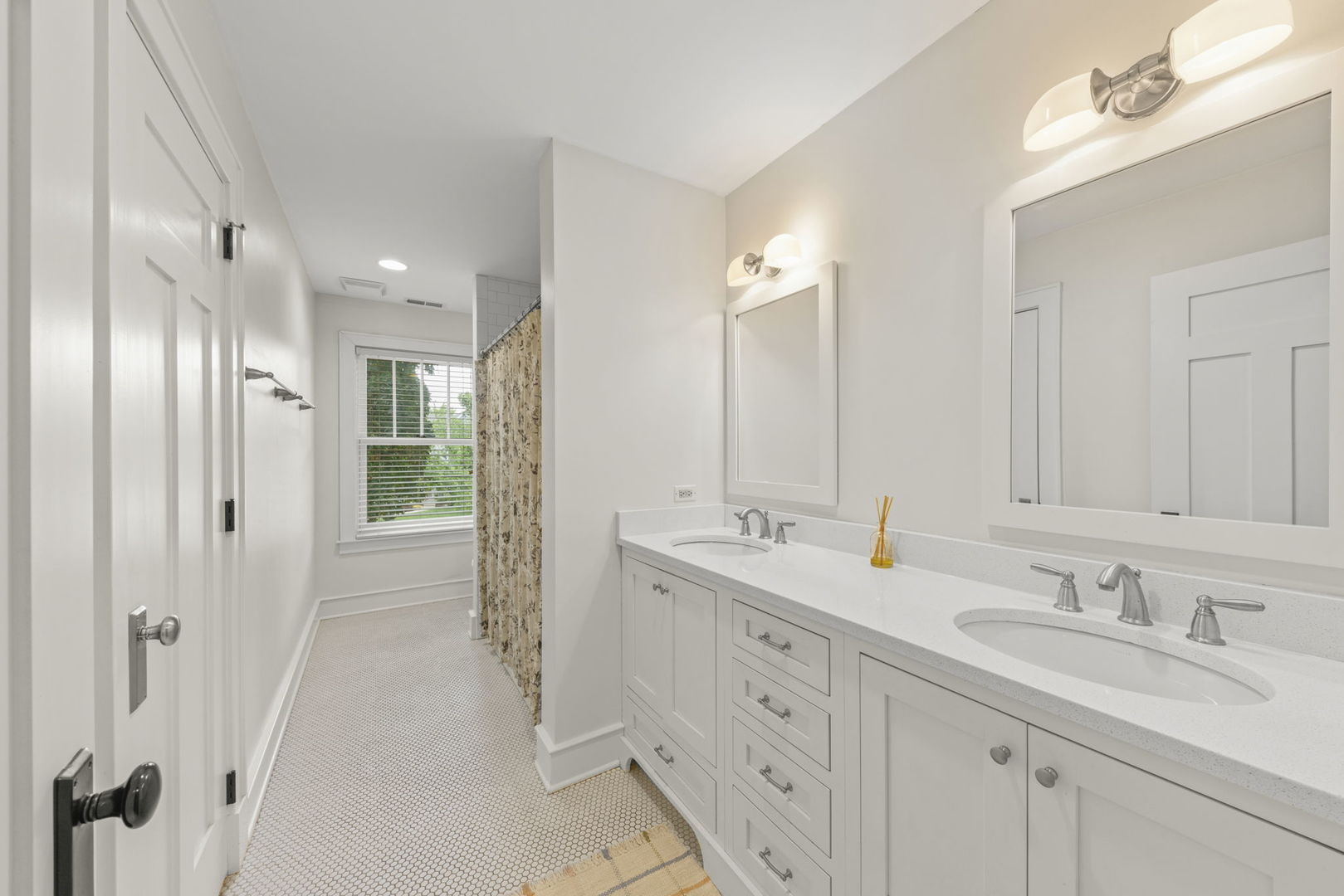 900 East Indiana Street Wheaton, IL 60187 - Photo 30 of 54 a bathroom with a double vanity sink mirror and double