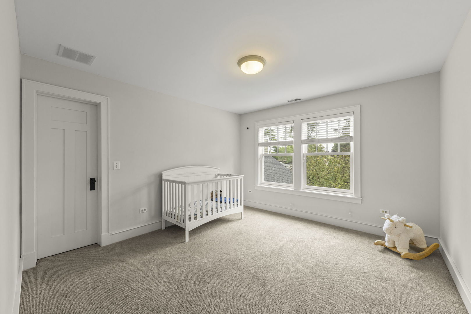 900 East Indiana Street Wheaton, IL 60187 - Photo 31 of 54 a view of an empty room with a window