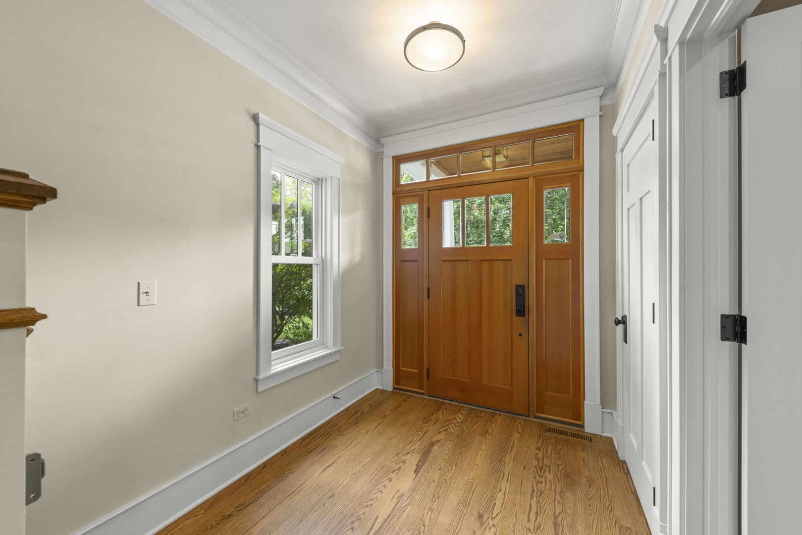 900 East Indiana Street Wheaton, IL 60187 - Photo 4 of 54 a view of an empty room with a window