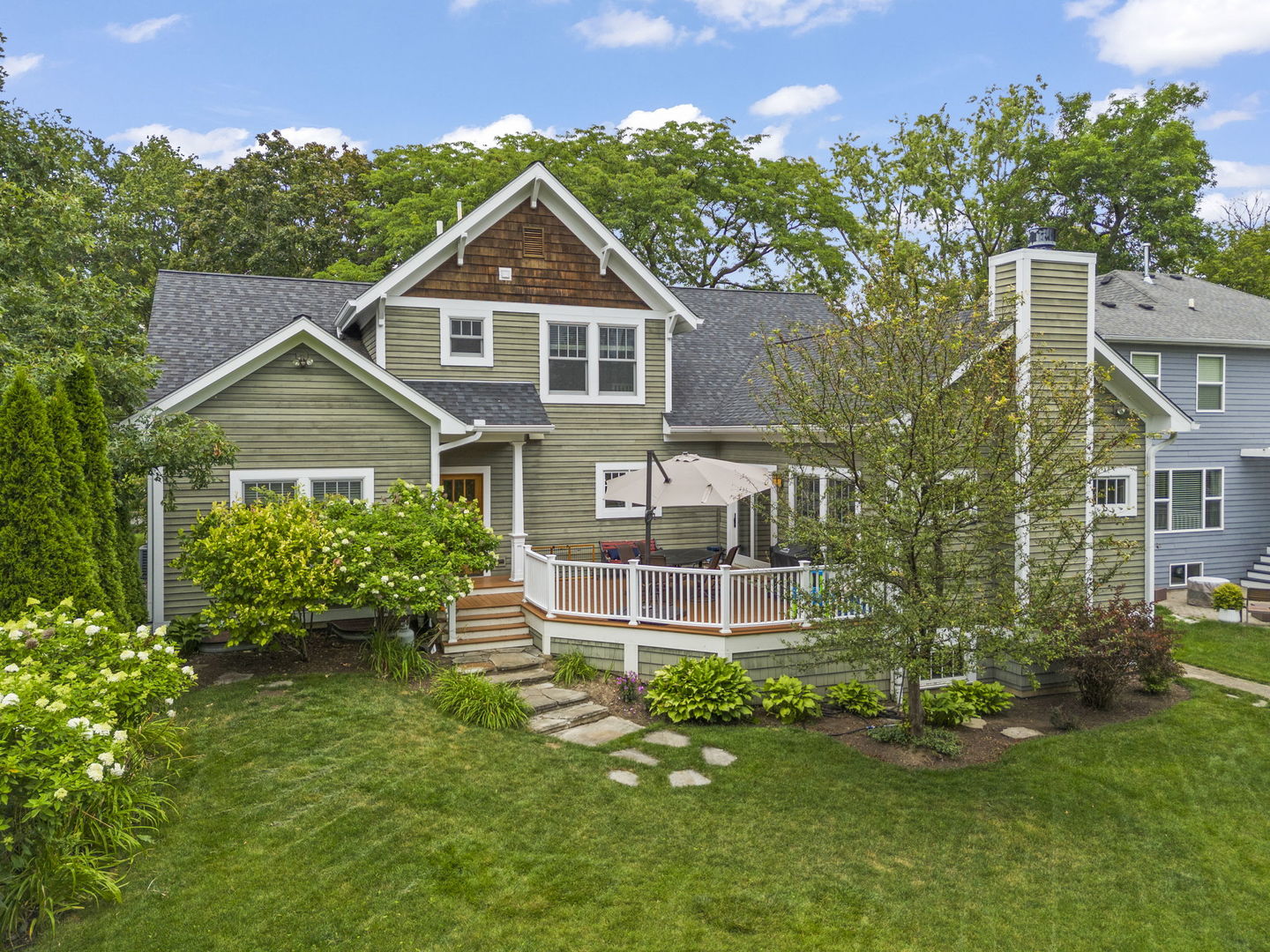 900 East Indiana Street Wheaton, IL 60187 - Photo 44 of 54 a front view of a house with a yard