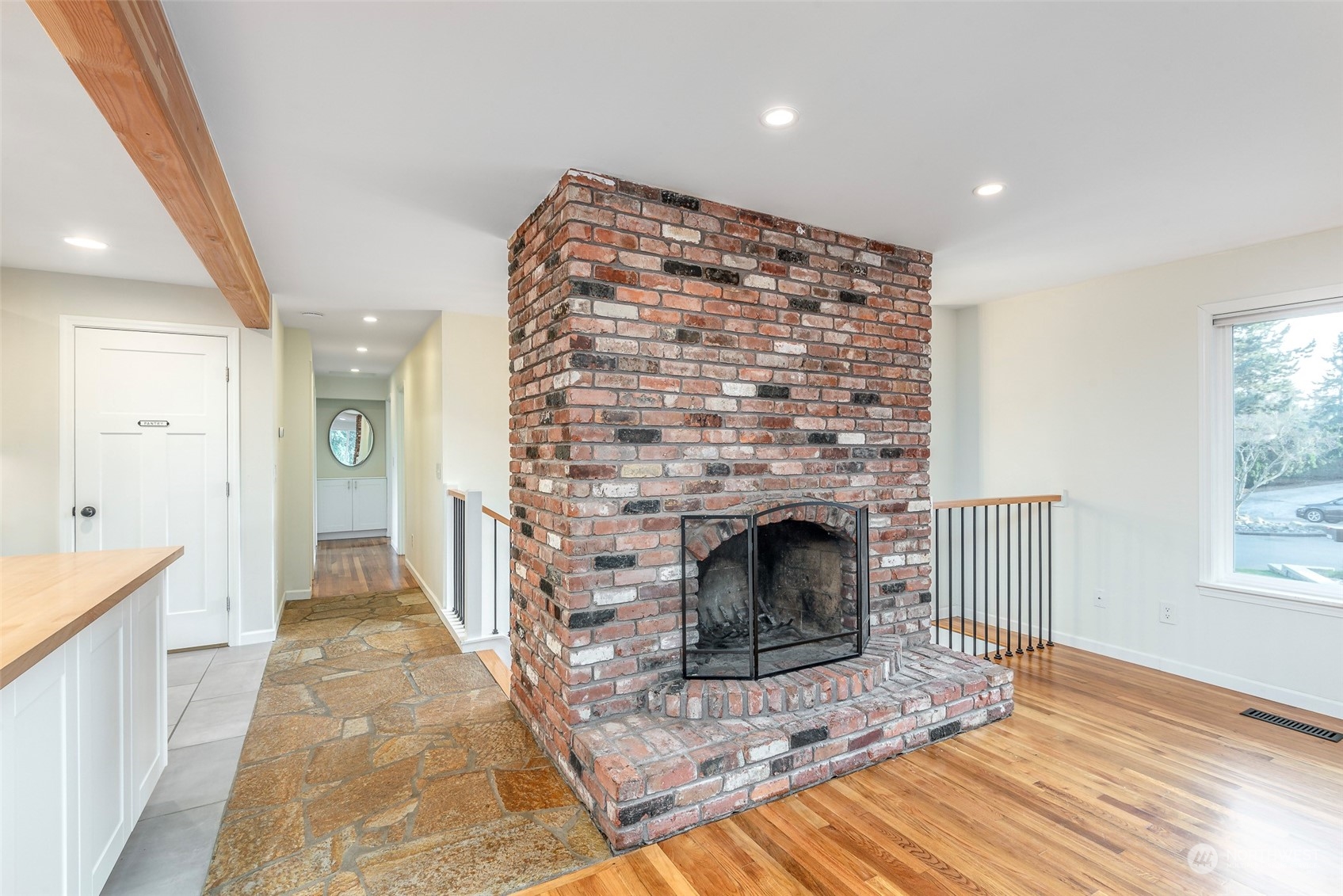3016 Southwest 325th Place Federal Way, WA 98023 - Photo 12 of 40 a living room with a fireplace in it