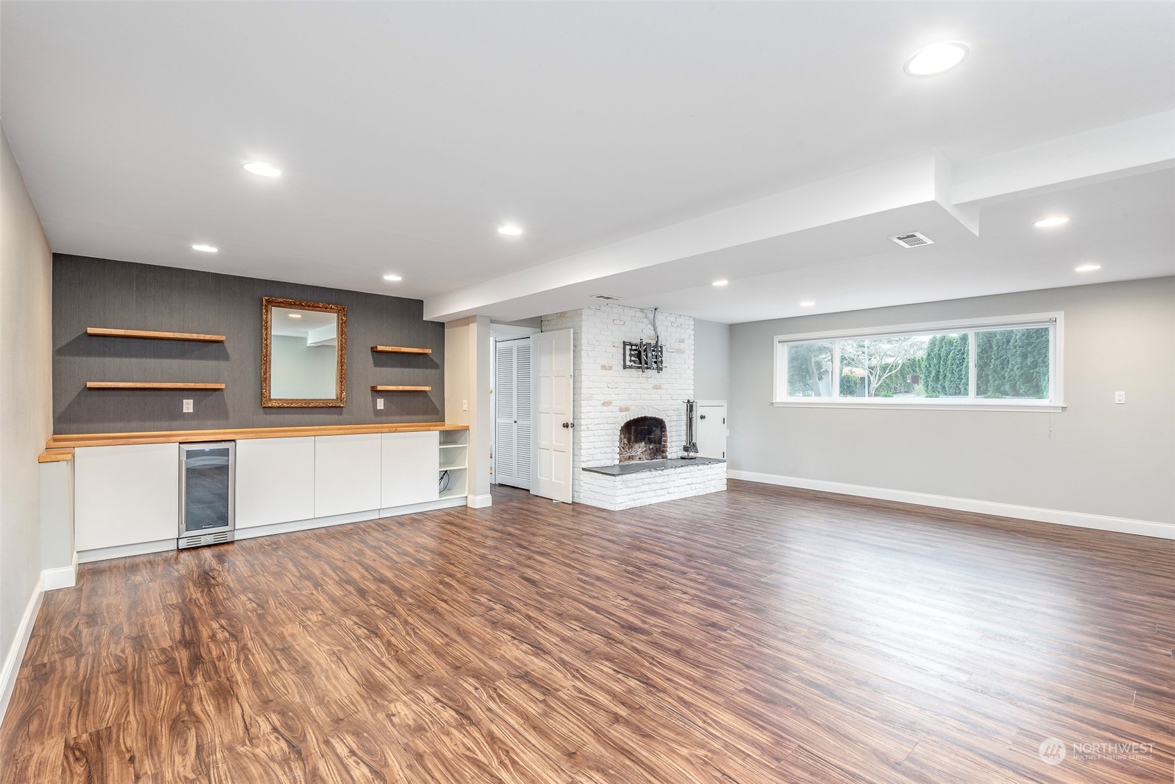 3016 Southwest 325th Place Federal Way, WA 98023 - Photo 20 of 40 a view of empty room with wooden floor and windows