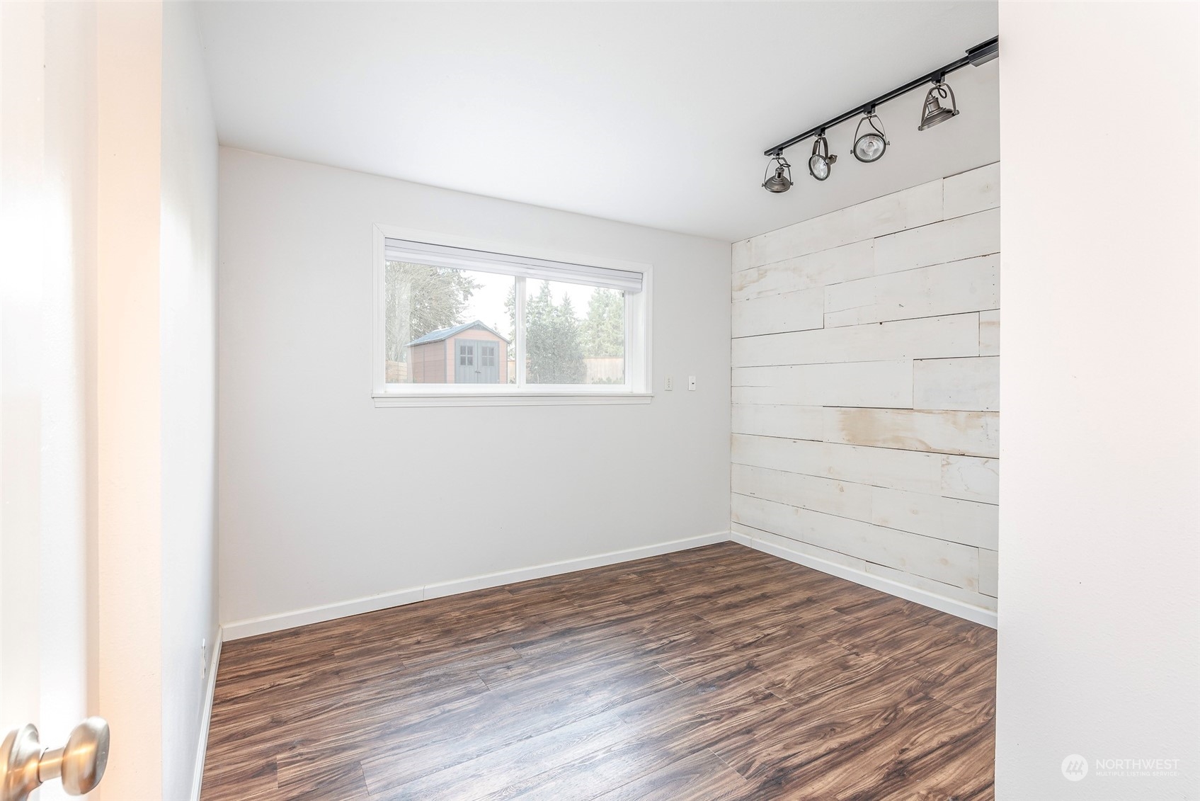 3016 Southwest 325th Place Federal Way, WA 98023 - Photo 22 of 40 an empty room with wooden floor and windows