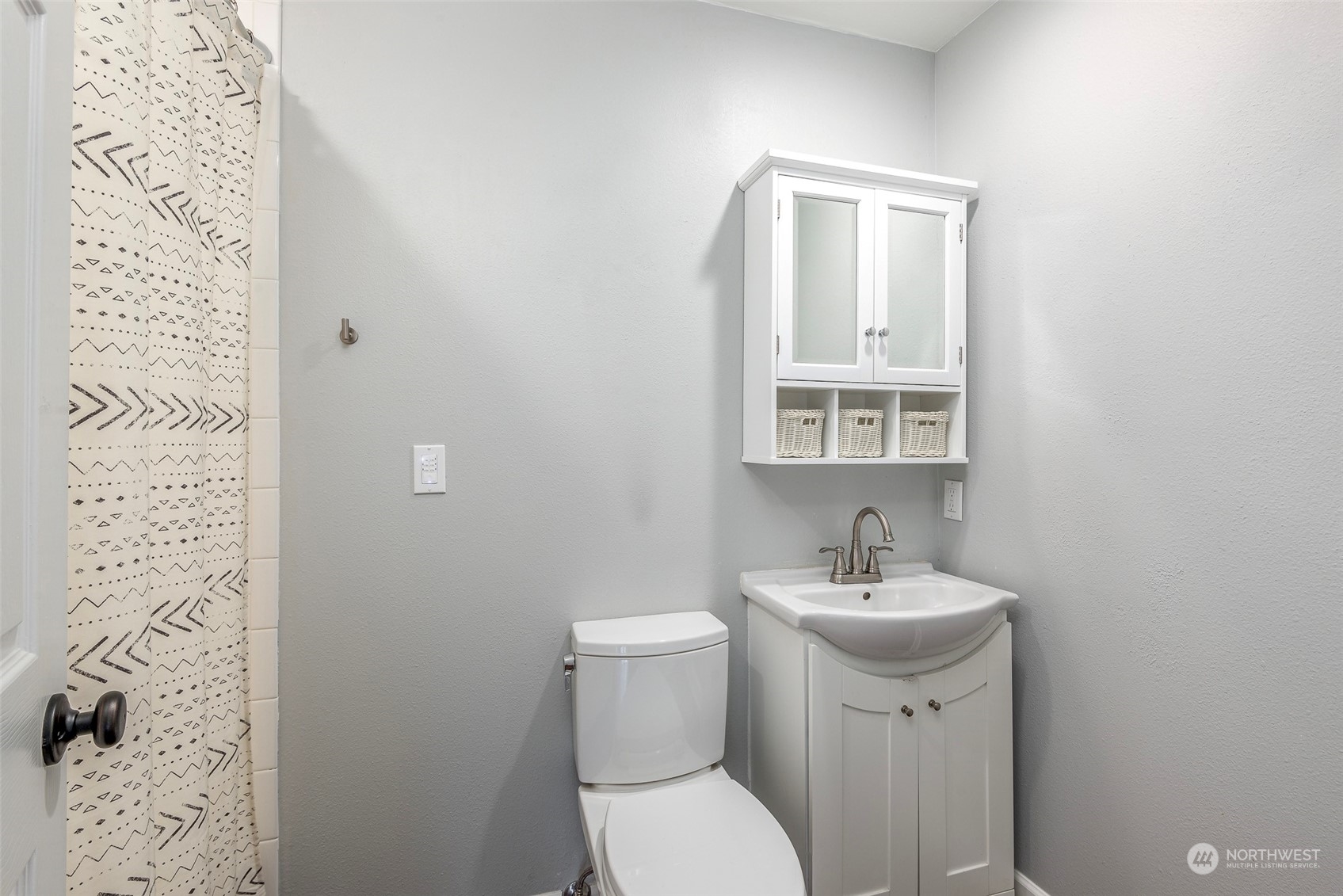 3016 Southwest 325th Place Federal Way, WA 98023 - Photo 24 of 40 a bathroom with a sink toilet and mirror