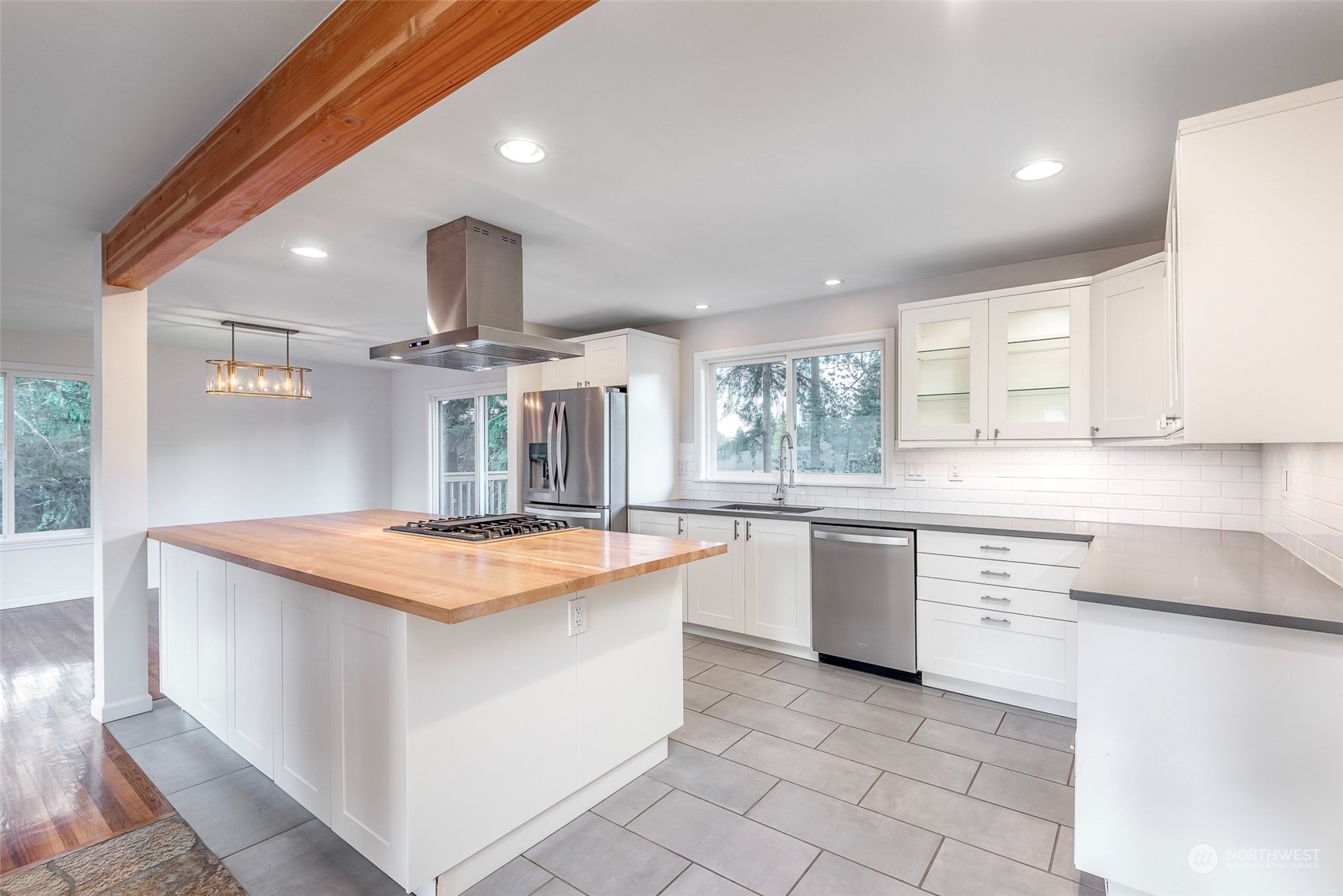 3016 Southwest 325th Place Federal Way, WA 98023 - Photo 4 of 40 a kitchen with stainless steel appliances granite countertop a sink and a stove