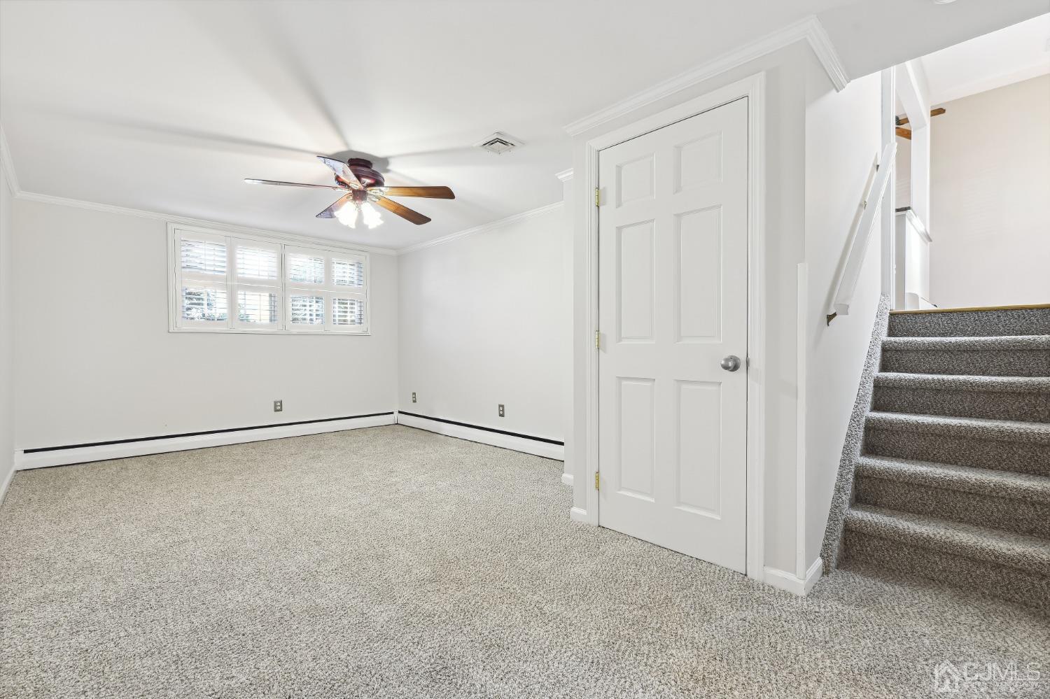 35 Miliken Road Colonia, NJ 07067 - Photo 16 of 23 an empty room with windows and fan