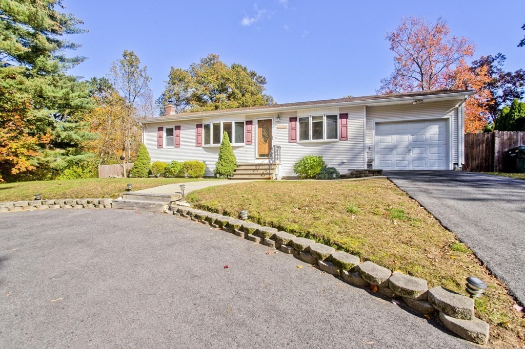 183 Peekskill Avenue Springfield, MA 01129 - Photo 1 of 31 front view of a house with a yard