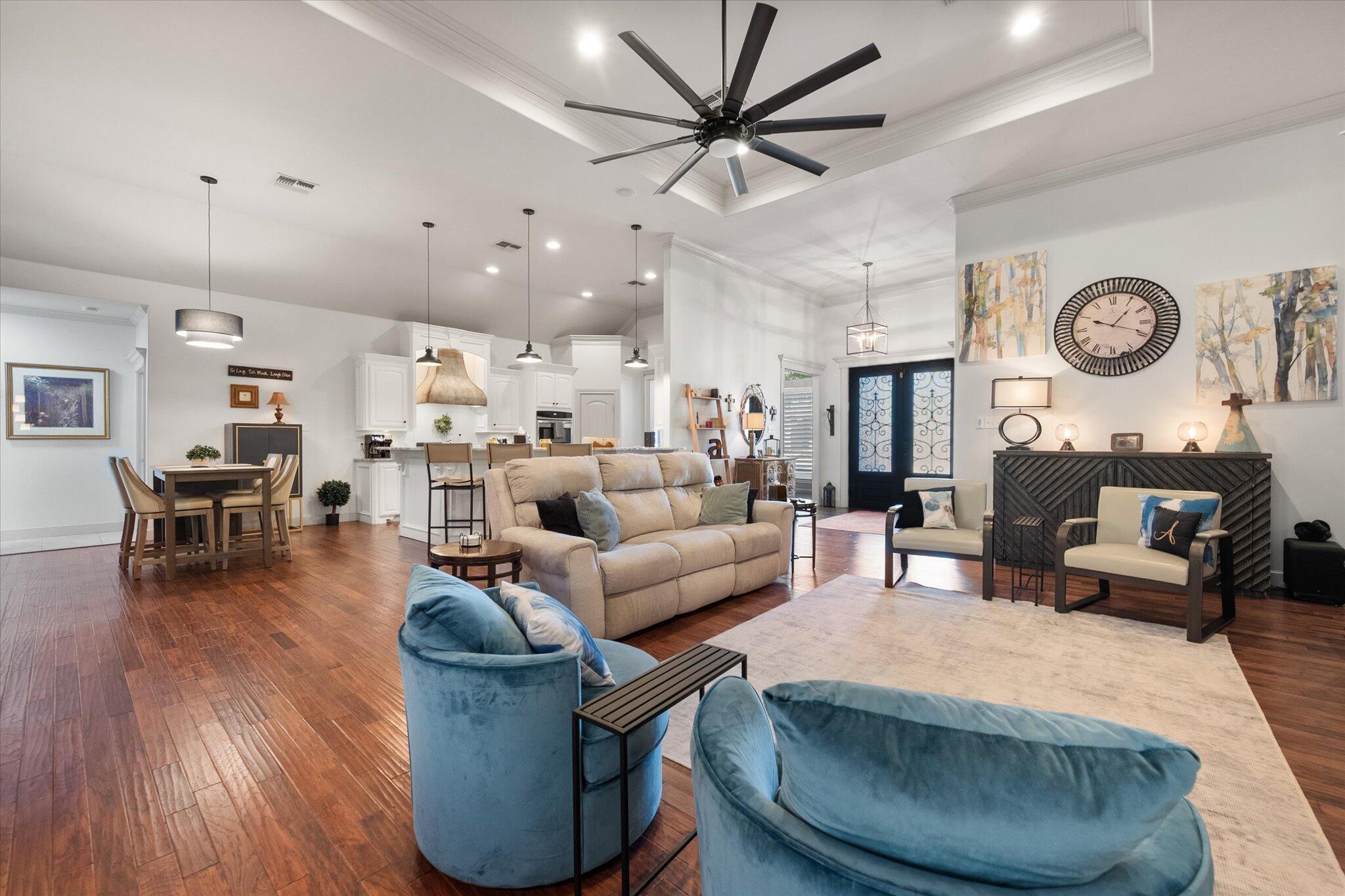 6021 89th Street Lubbock, TX 79424 - Photo 19 of 41 a living room with furniture and wooden floor